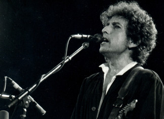Bob Dylan “soprando o vento“